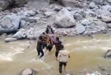 Rain wreaks havoc in Uttarkashi; sick woman carried 5 km to hospital on a makeshift stretcher.