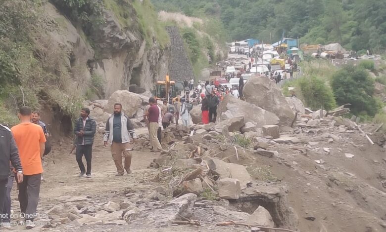 Road on Badrinath Highway destroyed by massive falling boulder; travel resumed after eight hours.