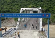 Dispute over welcome board at India-Nepal bridge; name of Indian village removed.